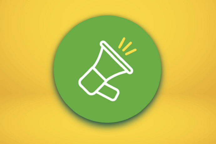 Vor einem gelben Hintergrund ist auf einem hellgrünen Kreis ein weißes Icon eines Megaphons abgebildet.